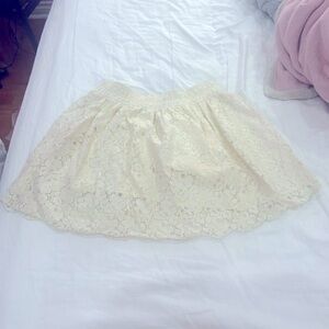 Aritzia Talula cream floral lace skirt from Aritzia